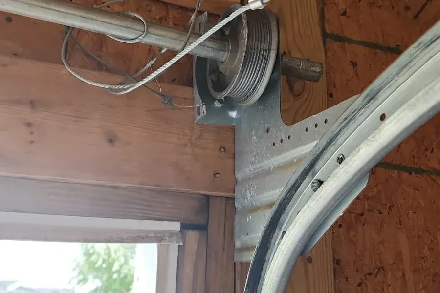 Goldman’s technician repairing a garage door in Michigan